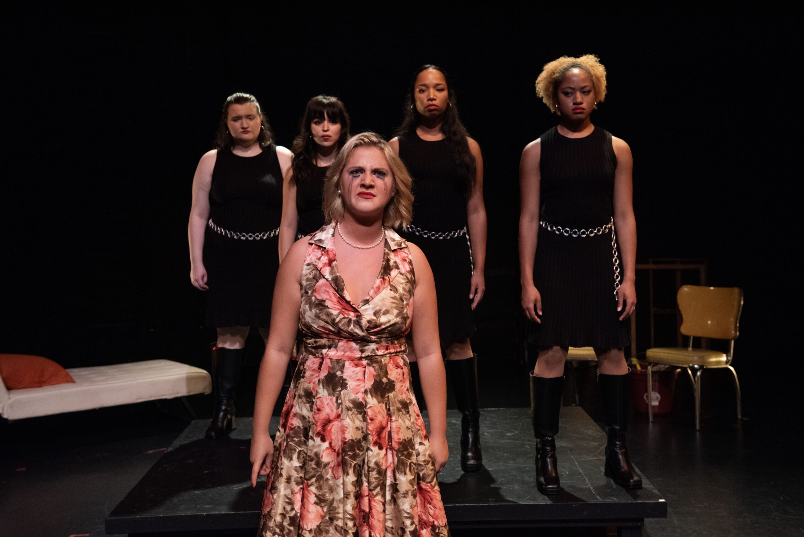 a group of women on a stage