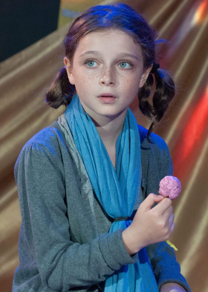 On Camera Acting Workshop (9-11) a girl holding a candy