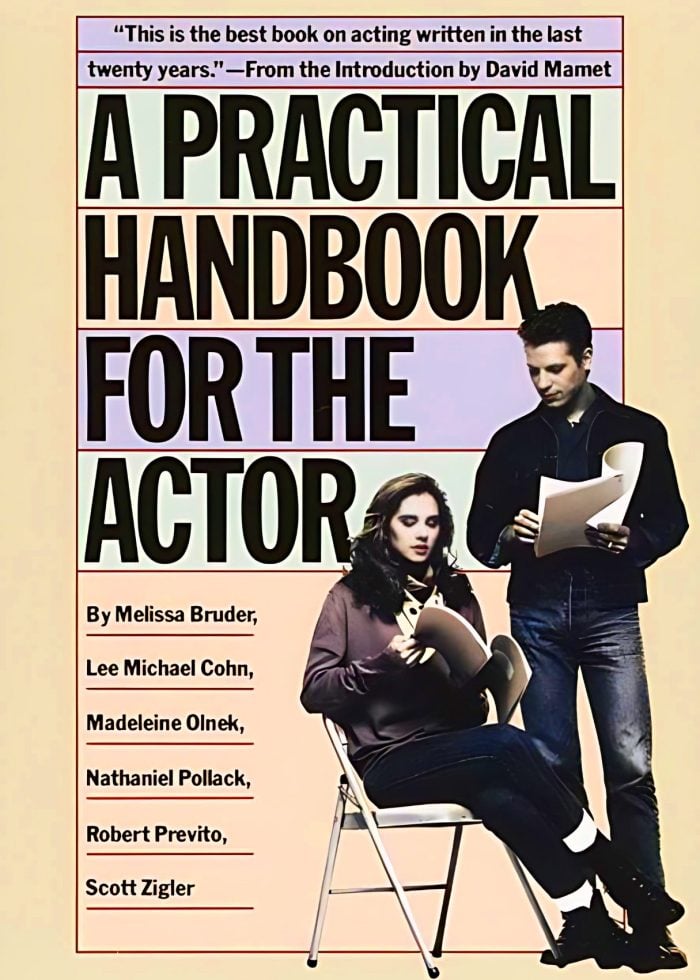 a man and woman reading a book